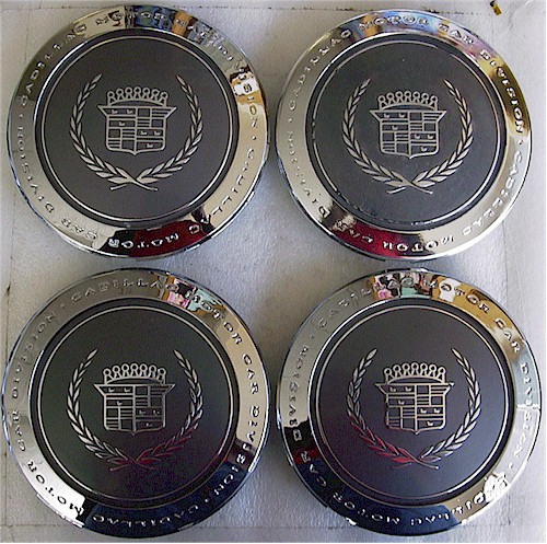 Cadillac deville sales gold center caps